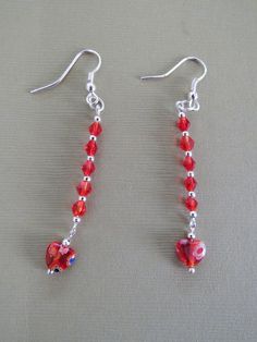 Heart and Crystal Earrings red drop is approx 2 inches Red Handmade Dangle Crystal Earrings, Handmade Red Crystal Dangle Earrings, Red Handmade Crystal Dangle Earrings, Handmade Red Crystal Drop Earrings, Red Drop Earrings For Valentine's Day, Handmade Red Crystal Earrings For Gift, Red Dangle Heart Earrings As A Gift, Red Dangle Heart Earrings, Red Dangle Heart Earrings For Gift