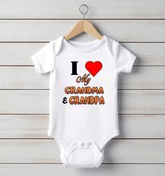 Rapunzie's heartwarming baby onesie, the perfect way for your little one to express their love for their beloved grandparents. With the sweet message "I Love My Grandma & Grandpa" beautifully displayed, this onesie is sure to melt hearts wherever your baby goes. Crafted with utmost care, our baby onesie is made from 100% cotton, ensuring maximum comfort and breathability for your little bundle of joy. The soft fabric gently caresses their delicate skin, keeping them cozy and happy all day long. I Love My Grandma, Sweet Message, Grandma And Grandpa, Sweet Messages, The Sweet, Baby Bodysuit, Little One, Soft Fabric, Soft Fabrics