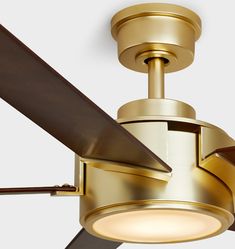 a ceiling fan with a light on top of it and a wooden blade in the middle