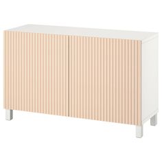 a white cabinet with wooden slats on the front and bottom, against a white background