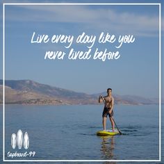 a man riding on top of a yellow surfboard in the ocean with a quote above it