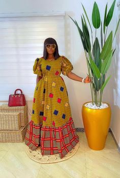 Ankara long dress  made with two pattern fabric Yellow Patchwork Maxi Dress, Fitted Ankara Fabric Maxi Dress With Short Sleeves, Yellow Ankara Fabric Maxi Dress, Bohemian Ankara Maxi Dress, African Dress Patterns, Ankara Kaftan, Long Ankara Dresses, Dresses Ankara, Ankara Dress Designs