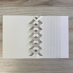 a piece of paper that has been cut into shapes