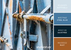 the color scheme is blue and brown with rusted metal bars on each door handle