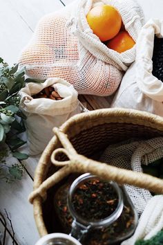 an assortment of fruits and vegetables in bags