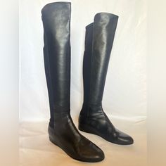 These Stunning Stuart Weizman Black Knee High Boots Almost Look Like New. Features A Leather Front And A Stetchy Back To Provide A Nice Fit For Your Calf. The Boots Have Some Small Creases. The Boots Have A 2 Inch Wedge. They Are 21 Inches Tall. Size 9. Made In Spain. Fitted Flat Heel Boots For Workwear, Formal Boots With Leather Trim For Fall, Formal Fall Boots With Leather Trim, Formal Leather Trim Boots For Fall, Formal Calf Leather Boots With Leather Trim, Fitted Workwear Boots With Removable Insole, Fitted Black Boots With Removable Insole, Formal Boots With Leather Trim And Round Toe, Fitted Leather Boots With Low Heel