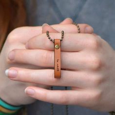 OurBe Still Inspirational Leather Necklace reminds us that sometimes life can feel so fast-paced and it's important to take in moments when we can just be still and remind ourselves of what's truly valuable in our lives. Be still and know. This bracelet reads "be still" in lowercase lettering. Small and delicate writing adds charm to the design. Writing has been engraved/burned into leather.Finishes + Details: Leather necklace pendant. Metal details are made from brass.Sizing Information: 0.25-i Leather Necklace Pendant, Design Writing, Leather Pendant, Be Still And Know, Fast Paced, Simple Necklace, Brass Chain, Leather Necklace, Ball Chain