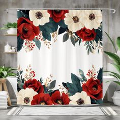 a shower curtain with red and white flowers on it