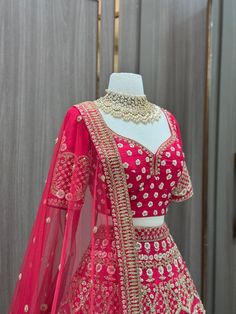 Valentine red intricate in blush floral thread embroidery with pearl, sequence, zari, zardozi and cut dana work lehenga. Completed look with similarly embroidered blouse and net blouse. Celebrate your luxurious moment in this valentine red color designer silk lehenga. Fabric: Raw Silk Size: 38/M Occasion: Wedding Ceremony or Reception. WASH CARE INSTRUCTIONS - Please Dry clean only when it is applicable. Slight color variation is possible due to digital photography. Ready to Ship! Net Blouses, Silk Lehenga, Bridal Lehenga, Embroidered Blouse, Raw Silk, Digital Photography, Red Color, Bridal Wear, Lehenga