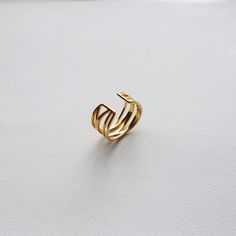 Introducing the Crossover Ring, an adjustable ring that will add style to your look. It's lightweight and stands out with its criss-cross design and simple design. -stainless steel, gold plated Crossover Ring, Cross Design, Cross Designs, Philadelphia Pa, Adjustable Ring, Adjustable Rings, Simple Design, Criss Cross, Crossover