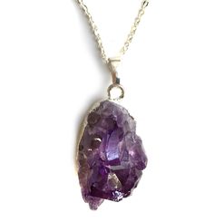 Amethyst Crystal Pendant Necklace. Multiple, natural amethyst points in a deep, dark purple give you ultimate purple perfection. Delight your neck with this whimsical, weighty chunk. Each stone is unique, so shape, clarity and size may vary. • 16" silver plate chain. Wear it close!• Lobster clasp closure• Silver electroplated base• Natural amethyst stone• Pendants average 25 mm wide, 25mm tall, 30mm thick Handmade in the USA in our Detroit, Michigan studio. This item is available for immediate s Purple Amethyst Pendant Crystal Necklace, Purple Raw Stone Crystal Pendant Necklace, Purple Amethyst Necklace With Raw Stone, Purple Raw Stone Necklaces For Healing, Spiritual Purple Necklace With Large Stone, Purple Amethyst Crystal Necklaces With Natural Stones, Purple Raw Stone Crystal Necklace For Healing, Spiritual Purple Crystal Necklace With Raw Stone, Healing Purple Crystal Necklace With Raw Stone