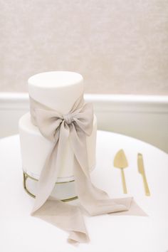 a white cake sitting on top of a table