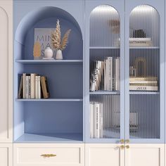 a blue bookcase filled with books next to white cupboards and drawers in a room