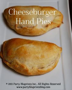 two pastries on a white plate with the words cheeseburger hand pies