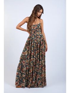 Take your style to the max with this dark green floral maxi dress. The open back adds a flirty touch while the floral print brings a touch of whimsy. Perfect for a picnic or a night out, this dress will have you feeling effortlessly chic. Color: Dark Green Fabric: 100% Polyester Style #: SM-D20427P Bohemian Ditsy Floral Maxi Dress For Garden Party, Flowy Maxi Floral Dress With Smocked Back, Bohemian Maxi Dress For Garden Party With Smocked Back, Bohemian Ditsy Floral Print Maxi Dress For Day Out, Bohemian Floral Print Maxi Dress For Casual Occasions, Green Bohemian Floral Maxi Dress, Bohemian Floral Print Maxi Dress For Casual Wear, Green Bohemian Maxi Floral Dress, Bohemian Floral Print Sundress For Casual Wear