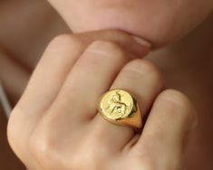 Give the perfect, personalized touch with carved zodiac signet rings. Whether you're looking for a pinky signet ring for men or signet ring for your mom, we have the perfect carved zodiac signet ring just for you! Made of solid sterling silver or plated with 22k gold vermeil, our astrology signet rings are sure to make an elegant statement. Scorpio ring, Aries ring or any other zodiac signet ring is ideal for mothers day and Leo will put a smile on any special person's face. An Aquarius signet r Edgy Elegant Style, Cow Ring, Aries Ring, Scorpio Ring, Bull Ring, Pinky Signet Ring, Three Necklaces, Zodiac Pendant Necklace, Zodiac Rings