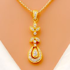 diamond-classy-leaf-adorned-diamond-pendant-set Gold Diamond Necklace With Brilliant Cut Teardrop Pendant, Gold Brilliant Cut Teardrop Pendant Diamond Necklace, Gold Teardrop Pendant Diamond Necklace With Brilliant Cut, Gold Drop Diamond Necklace With Brilliant Cut, Gold Pendant Set, Sophisticated Jewelry, Diamond Pendant Sets, Vs Diamond, Yellow Gold Pendants