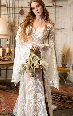 a woman in a white dress holding a bouquet