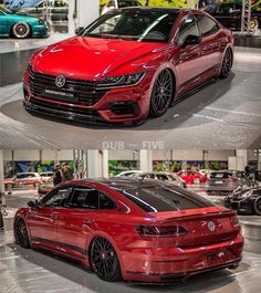 two different views of the front and side of a red volkswagen car in a showroom