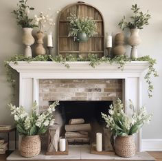 a fireplace decorated with flowers and candles