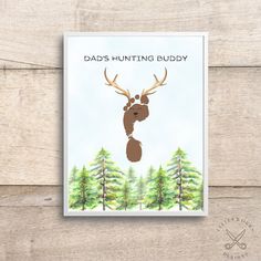 a card with an image of a deer's head and the words dad's hunting buddy