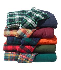 a pile of blankets sitting on top of each other