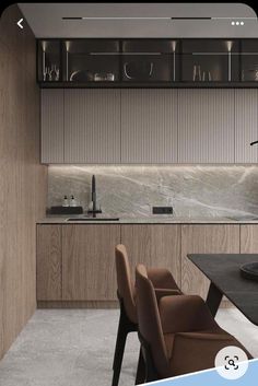 an image of a modern kitchen with marble countertops and wooden cabinets in the background