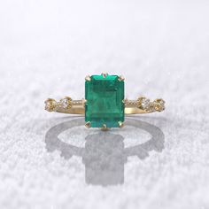 emerald engagement ring Colombian emerald lab-grown 2-carat emerald-cut 8.5x6.5mm knife-edge milgrain ring MORE INFORMATION ❥ The craft period is about 5-7 business days. ❥ Free shipping via DHL ❥ Available in a combination of 14K Rose Gold, 14K Yellow Gold, 14K White Gold ❥ Arrives in our box, ready for gift-giving (and proposing ) ❥ GioielliRings engagement ring : Gem Type- lab-grown Colombian emerald Weight-2 ct (approx) Size- 8.5x6.5mm Color- Green Clarity- Cut(Shape): Brilliant faceted tran Emerald Cut Moissanite Promise Ring, Solitaire Emerald Cut Emerald Wedding Ring, Radiant Cut Emerald Ring With Vvs Clarity, Timeless Emerald Ring With Radiant Cut, Classic Moissanite Emerald Ring For May Birthstone, Elegant Emerald Ring With Princess Cut And Accent Stones, Radiant Cut Emerald Ring In Fine Jewelry, Elegant Princess Cut Emerald Ring With Accent Stones, Timeless Emerald Ring With Accent Stones