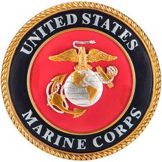 the united states marine corp emblem on a red and black circle with gold trimming