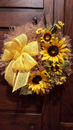 sunflowers and burlock tied together on a door