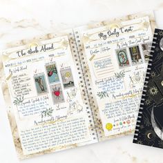 two notebooks with pictures and writing on them, one is open to show the inside pages