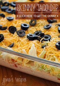 a casserole dish with black olives and cheese