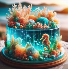 there is a cake decorated with seahorses and corals