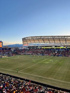 a soccer stadium filled with lots of people