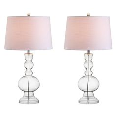 two clear glass table lamps with pink shades