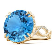 Secured in a double claw setting, the round GIA certified Swiss blue topaz sits pretty amid a crossover shank. The crossover shank is partially adorned with pavé-set diamonds. A stunner in 14k yellow gold , this Swiss blue topaz cocktail ring also features twisted rope detailing. Topaz Cocktail Ring, Swiss Blue Topaz Ring, Cartier Panthere, Bracelet Love, Swiss Blue Topaz, Baccarat, Hermes Birkin, Cocktail Ring, Yellow Gold Rings