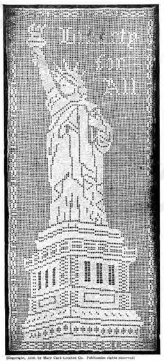 an old black and white photo of the statue of liberty