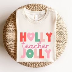 Celebrate the season in style with our cozy holiday teacher t-shirt, designed specifically for teachers. This festive shirt is perfect for wearing in the classroom or during your holiday break. Whether it is for Christmas or just the jolly winter season, this holiday-themed teacher shirt is ideal for adding a festive touch to your wardrobe. It also makes a thoughtful gift for any teacher who loves spreading holiday cheer. This classic unisex jersey short sleeve tee fits like a well-loved favorite. Soft cotton and quality print make users fall in love with it over and over again. These t-shirts have-ribbed knit collars to bolster shaping. The shoulders have taping for better fit over time. Dual side seams hold the garment's shape for longer. Bella + Canvas 3001 Unisex Jersey Short Sleeve Te Cozy Holiday, Holiday Break, Subscription Gifts, Festival Shirts, Teacher Tees, Teacher Tshirts, Holly Jolly, In The Classroom, The Classroom