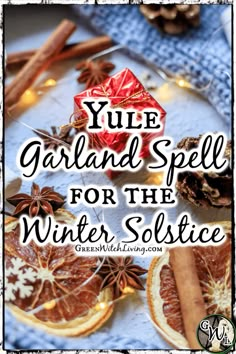 yule garband spell for the winter solstice with orange slices and cinnamons