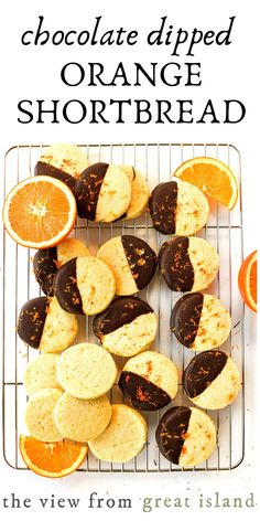 chocolate dipped orange shortbreads on a cooling rack