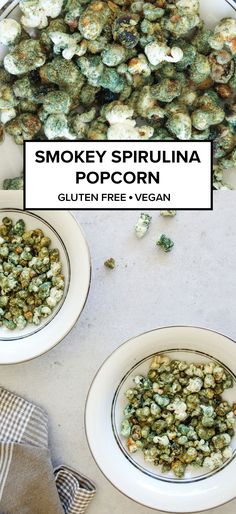 two white bowls filled with green sprouts next to a pile of other vegetables