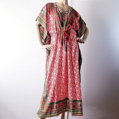 New With Tags. Rich African Dashiki Caftan. Lightweight Maxi Caftan Dress. Multicolored, With Red, Green, White, Yellow & Black. Beautiful Array Of Floral, Geometric, & African Prints. Adjustable Drawstrings At The Waist. Slits On The Lower Sides, V-Neck Collar, Very Flowy And Non Stretch. One Size. 100% Viscose *A Number Of Small (Normal) Imperfections Are Shown In The Last Closeup Pics. Please Read And Examine Them. Length=52" Across=35" Casual Red V-neck Kaftan, Red Bohemian Kimono For Festivals, Red Bohemian Kimono For Festive Occasions, Red Bohemian Flowy Kimono, Red Flowy V-neck Kaftan, Casual Red V-neck Kimono, Spring Holiday Bohemian Kaftan, Flowy Red Printed Kaftan, Bohemian Printed Maxi Dress For Festive Occasions