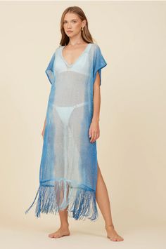 Your new favorite coverup for your next vacay, the new Metallic Mesh Knit Cover Up in Blue! Perfect for summer days, this coverup will have you looking stylish and feeling comfortable. Say goodbye to boring coverups and hello to fun in the sun with this metallic beauty featuring tassels at the bottom! Blue Breezy Summer Cover-up, Blue V-neck Beach Cover-up, Blue Beachy Cover-up For Beach Season, Blue V-neck Festival Cover-up, Blue V-neck Cover-up For Summer, Breezy Summer Pool Cover-up, Casual Blue Cover-up For Resort Season, Breezy Blue Summer Cover-up, Blue Beach Dress For Resort Season