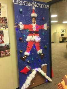 a door decorated to look like santa clause