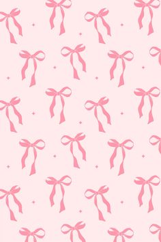 pink bows and stars are on a light pink background for wallpaper or wrapping paper