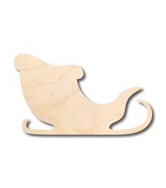 a wooden toy sleigh that is shaped like a cat on a white background