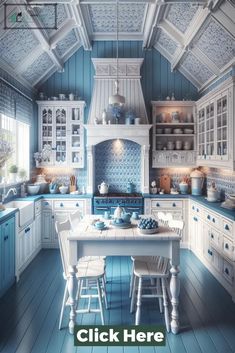 a blue and white kitchen with an island table in the center, surrounded by cabinets