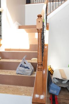 the stairs in this house have been stripped off and new carpet is laying on them