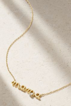 Persée's necklace is from the 'Around the Words' collection, which is filled with charming phrases cast to resemble delicate thread. Strung from an 18-karat gold chain, it has a dainty 'Mama' pendant and is finished with the brand's signature floating diamond. It'll make such a thoughtful gift for new mothers. Elegant Cable Chain Necklace For Mother's Day, Yellow Gold Initial Pendant Necklaces For Mother's Day, Elegant Everyday Name Necklace With Cable Chain, Anniversary White Gold Necklace In Recycled Gold, Dainty Gold-plated Name Necklace With Delicate Chain, Elegant Name Necklace With Delicate Chain For Mother's Day, Elegant Name Necklace For Mother's Day With Delicate Chain, Dainty Name Necklace With Clavicle Chain Pendant, Everyday Yellow Gold Necklaces For Mother's Day