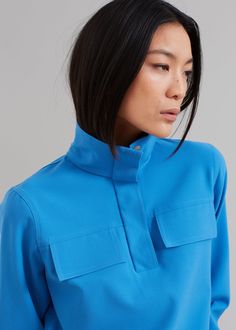 Color: Electric Blue Woven crepe fabric with slight stretch Relaxed fit Funnel neckline Flap detailing at bust 1/4 button closure with concealed placket Unlined 68% Recycled Polyester 29% Ecovero Viscose 3% Elastane Dry Clean Only By Nanushka. Made in Hungary Denim Suit, Paris Woman, Color Analysis, Leather Texture, Crepe Fabric, Funnel Neck, Swimwear Accessories, Funnel, Hungary